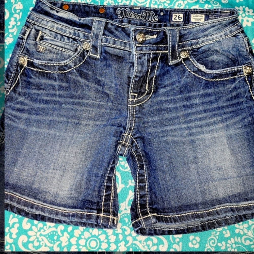 Miss Me Shorts with bling crosses on back pockets. Size 26. Good used condition.